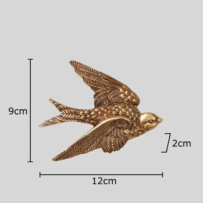 Ganchos de pared DecorBites™ con forma de paloma para una elegante exhibición en la sala de estar