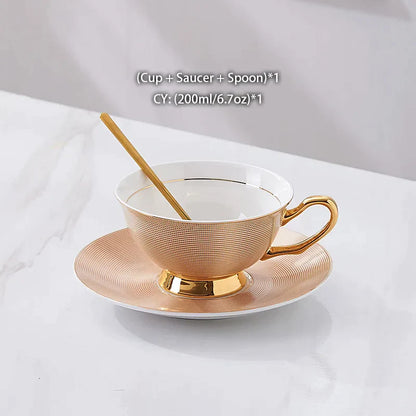 Juego de té DecorBites™ de porcelana dorada, 200 ml. Elegante juego de taza, platillo y cuchara.
