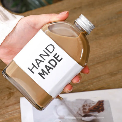 DecorBites™ Clear Glass Beverage Bottles: Reusable for Juicing, Smoothies, Kombucha, Tea, Milk, and Wine