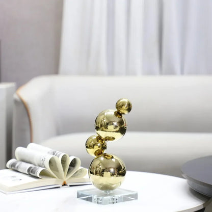 DecorBites™ Gold Metal Spheres Stack Art Pieces - Geometric Decorative Figurines