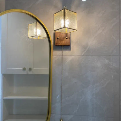 Aplique de pared DecorBites™ con luz LED, diseño cúbico de madera de nogal y cristal, con interruptor de cadena.