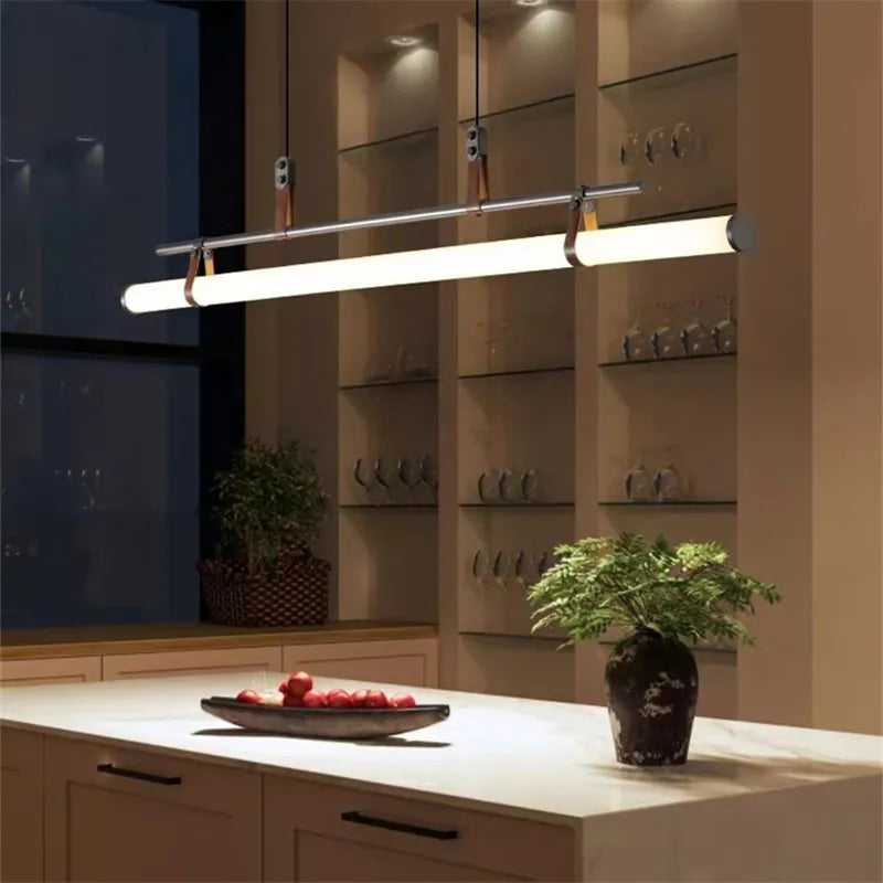 ثريا Lucien Tube من DecorBites™‎، مصنوعة من الجلد الأسود والذهبي