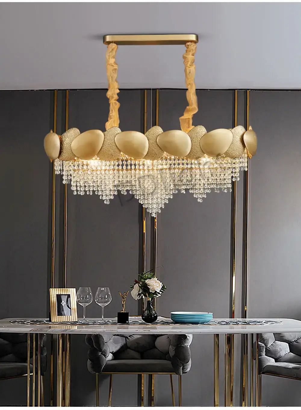 Luxury gold crystal led ceiling chandelier featuring sculptural egg-shaped orbs and cascading crystal droplets for living room use.