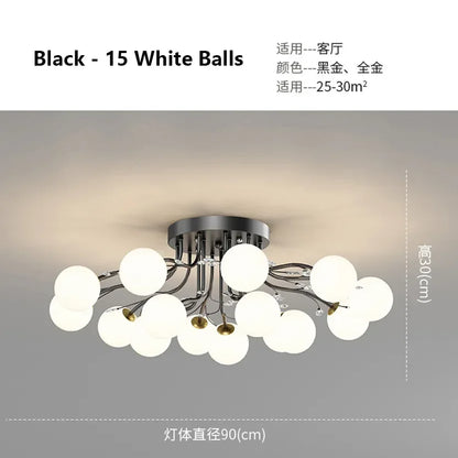 ثريا DecorBites™ باللون الأسود الذهبي مع مصابيح معلقة على شكل كرة زجاجية شفافة على شكل نجمة