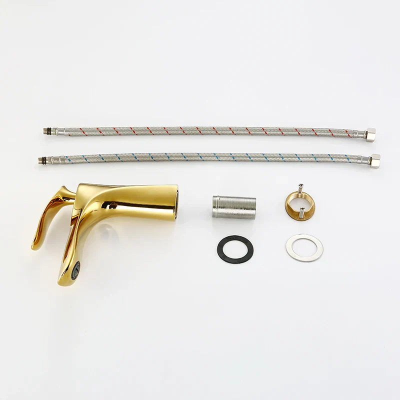 Grifo mezclador DecorBites™ Gold con cascada dorada para lavabo e inodoro