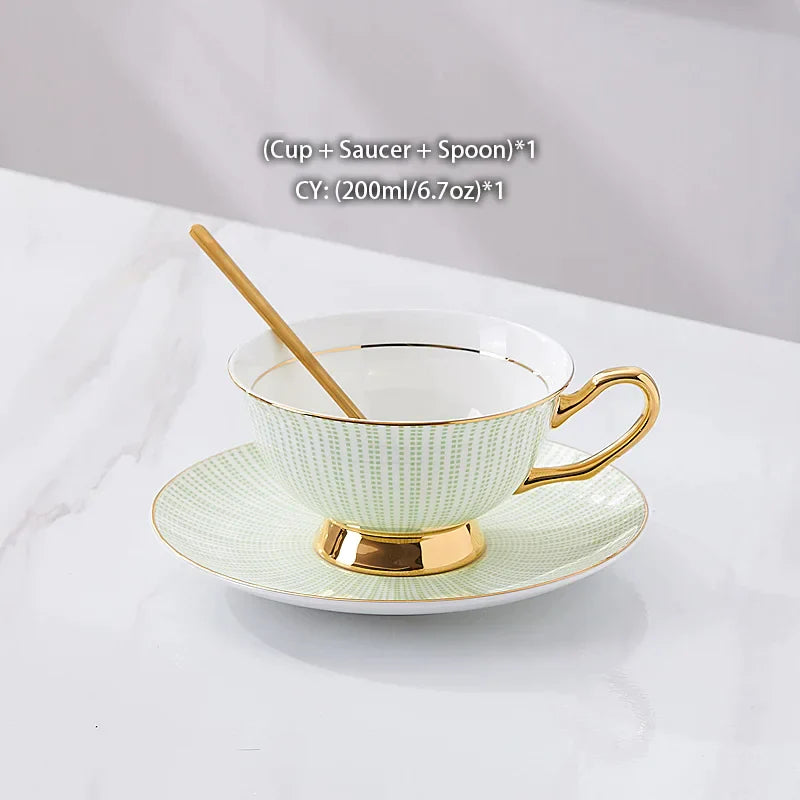 Juego de té DecorBites™ de porcelana dorada, 200 ml. Elegante juego de taza, platillo y cuchara.
