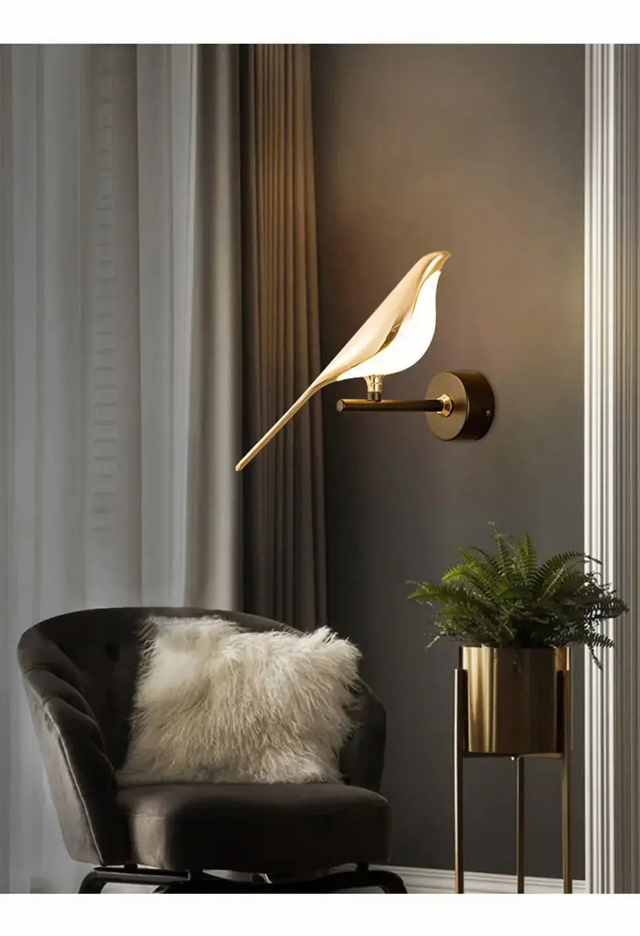 Gold-toned art deco swan wall lamp with crystal and smooth metallic finish designed as a sleek wall lamp for bedroom bedside use.