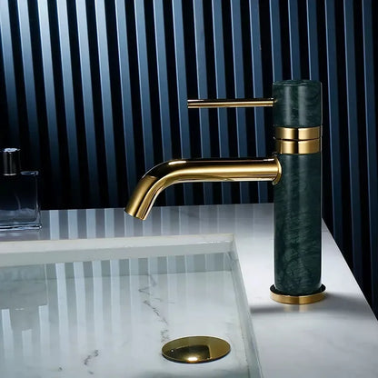Grifo de baño DecorBites™ en oro cepillado con caño giratorio y detalles de mármol