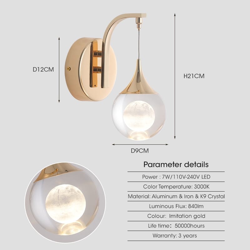 Modern luxurious crystal led wall sconce featuring a gold-toned aluminum-iron frame with a teardrop-shaped glass globe for bedroom use.