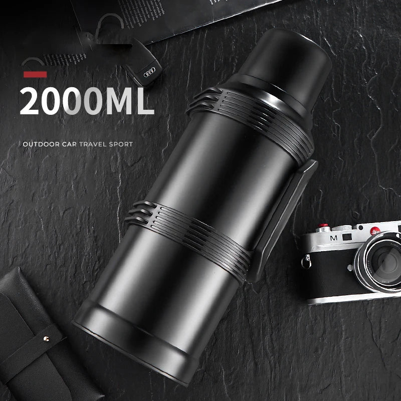 Hervidor térmico DecorBites™ de 2000 ml con revestimiento de vidrio y asa plegable