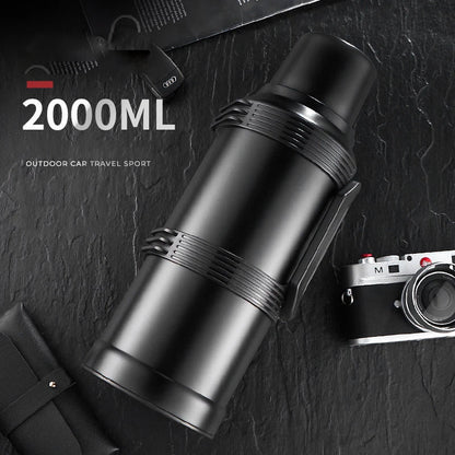 Hervidor térmico DecorBites™ de 2000 ml con revestimiento de vidrio y asa plegable