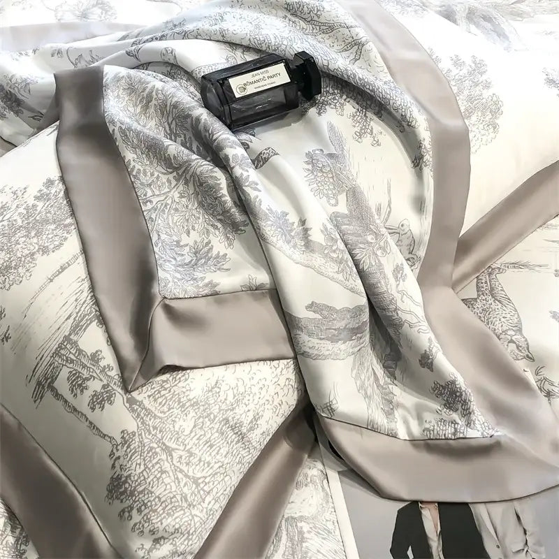 a sleek silver zipper on a eucalyptus fiber duvet cover with white fabric track set against sage green bedding