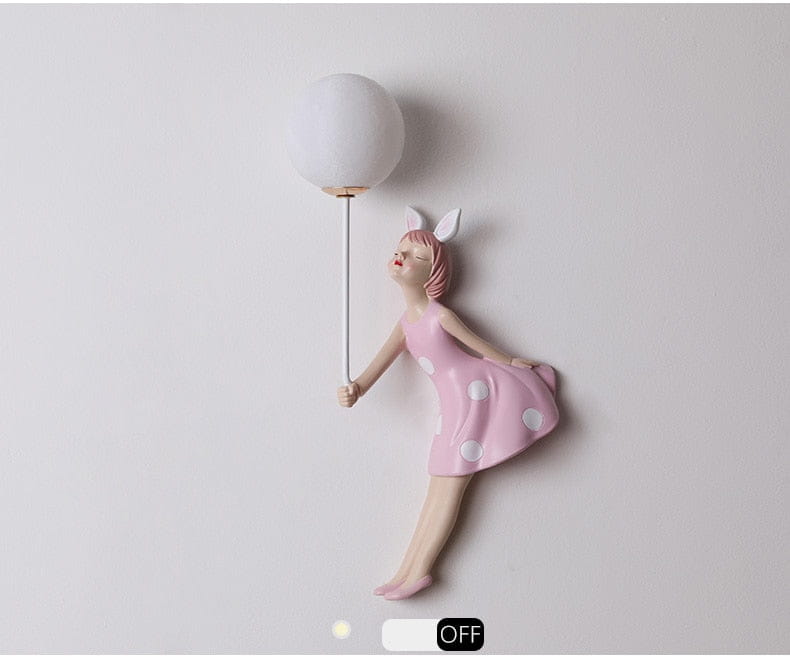 Whimsical pink polka dot fairy girl wall lamp featuring a pink bunny girl design with a white spherical balloon, suitable as a decorative girl wall lamp for a bedroom.