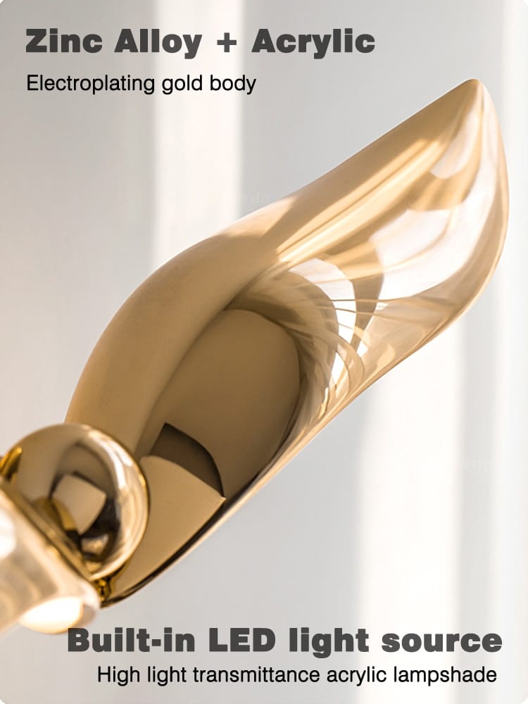 Luxury minimalist creative seagull wall lamp featuring a gold electroplated zinc alloy and acrylic sleek curved design for bedroom and living room use.
