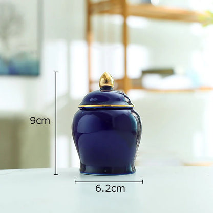 Tarro de cerámica DecorBites™ dorado para té con tapa, ideal para decorar el escritorio.