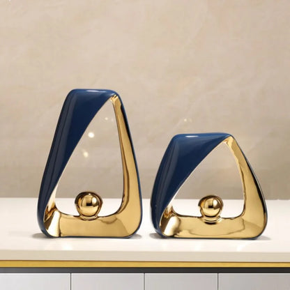 Escultura de esqueleto con triángulos geométricos y bola dorada DecorBites™: Figura decorativa abstracta para el hogar