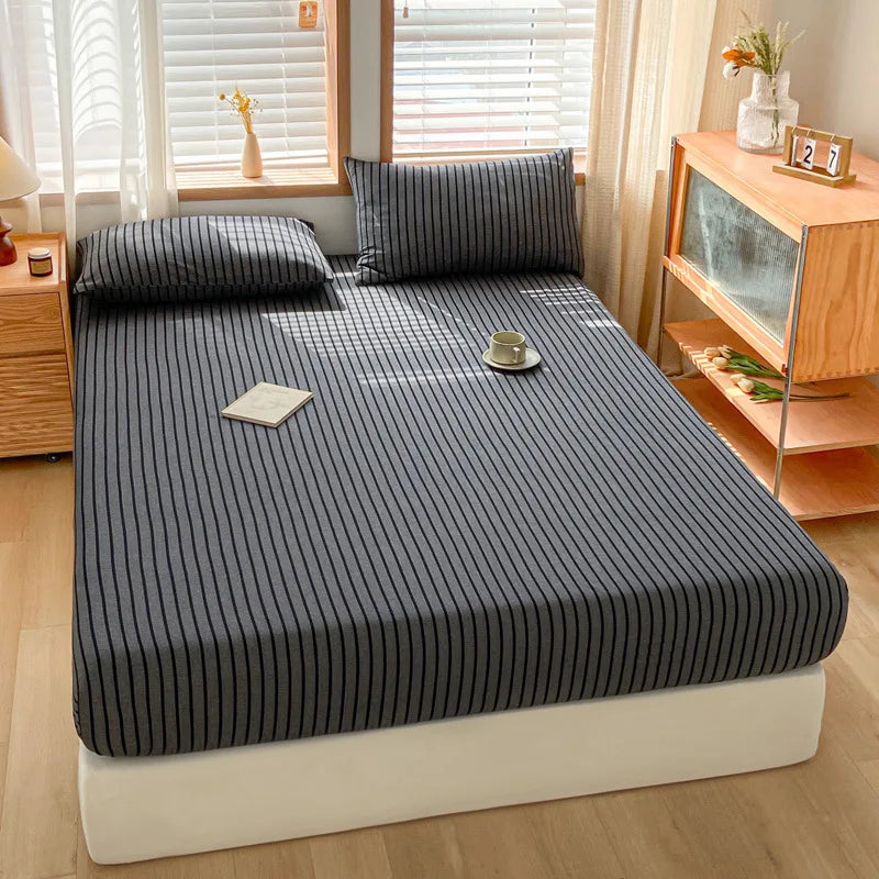 غطاء مرتبة مريح فردي من DecorBites™‎ مخطط من القطن مع شريط مطاطي