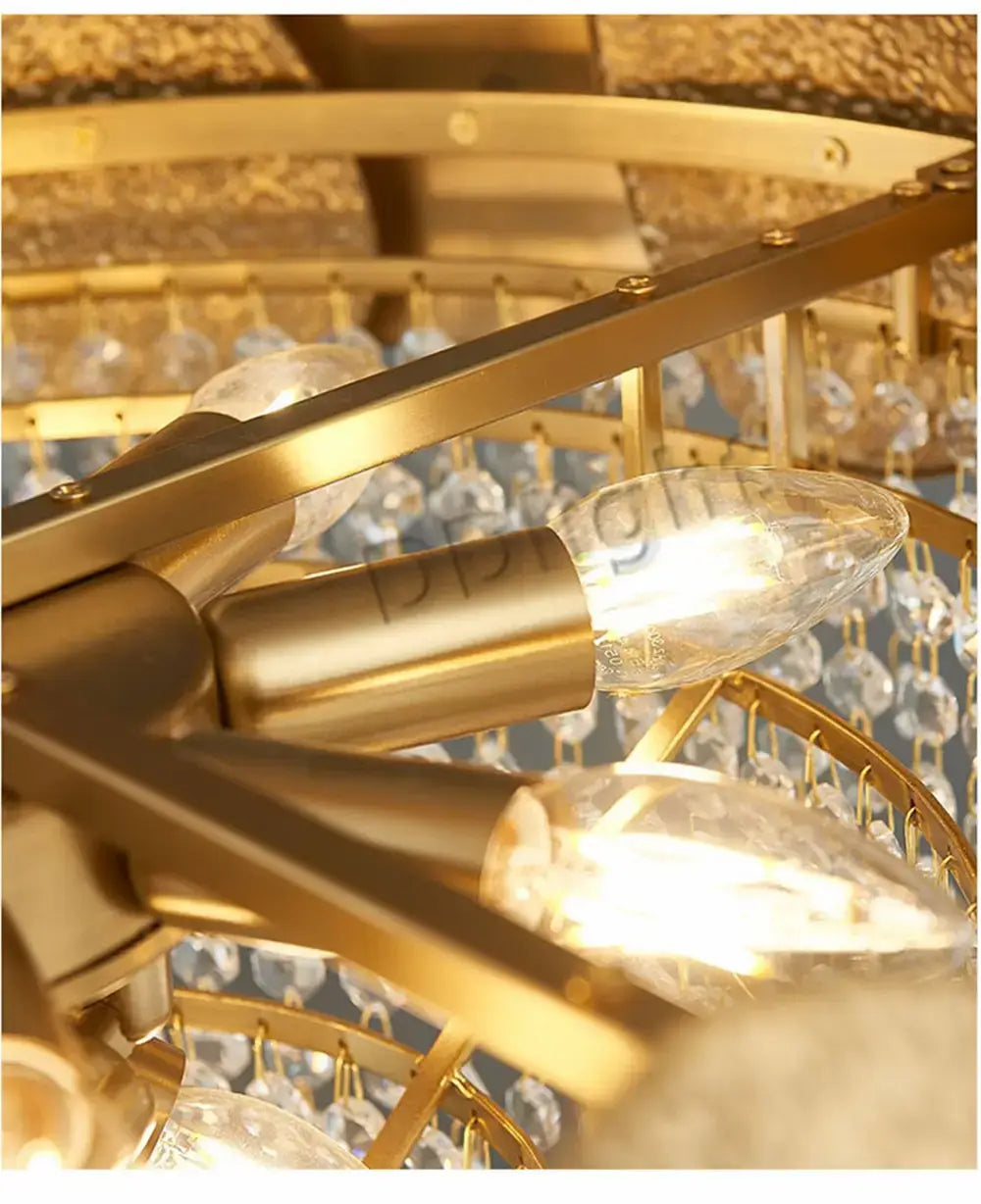 Luxury gold crystal led ceiling chandelier featuring clear crystal droplets and exposed light bulbs for living room lighting.