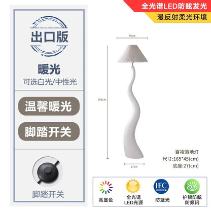 Lámpara de pie DecorBites™ de resina color crema con LED E27 para una decoración e iluminación elegantes en la sala de estar.