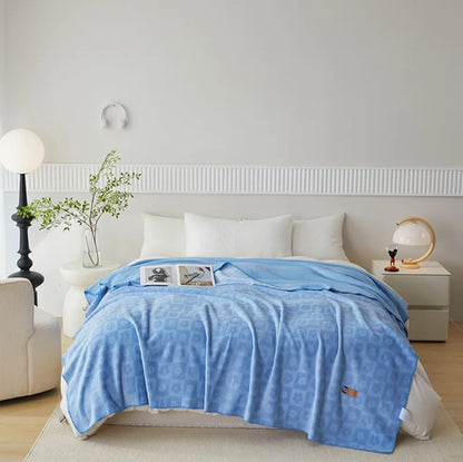 Manta DecorBites™ de terciopelo jacquard color leche para aire acondicionado | Chal cálido y de viaje para todas las estaciones