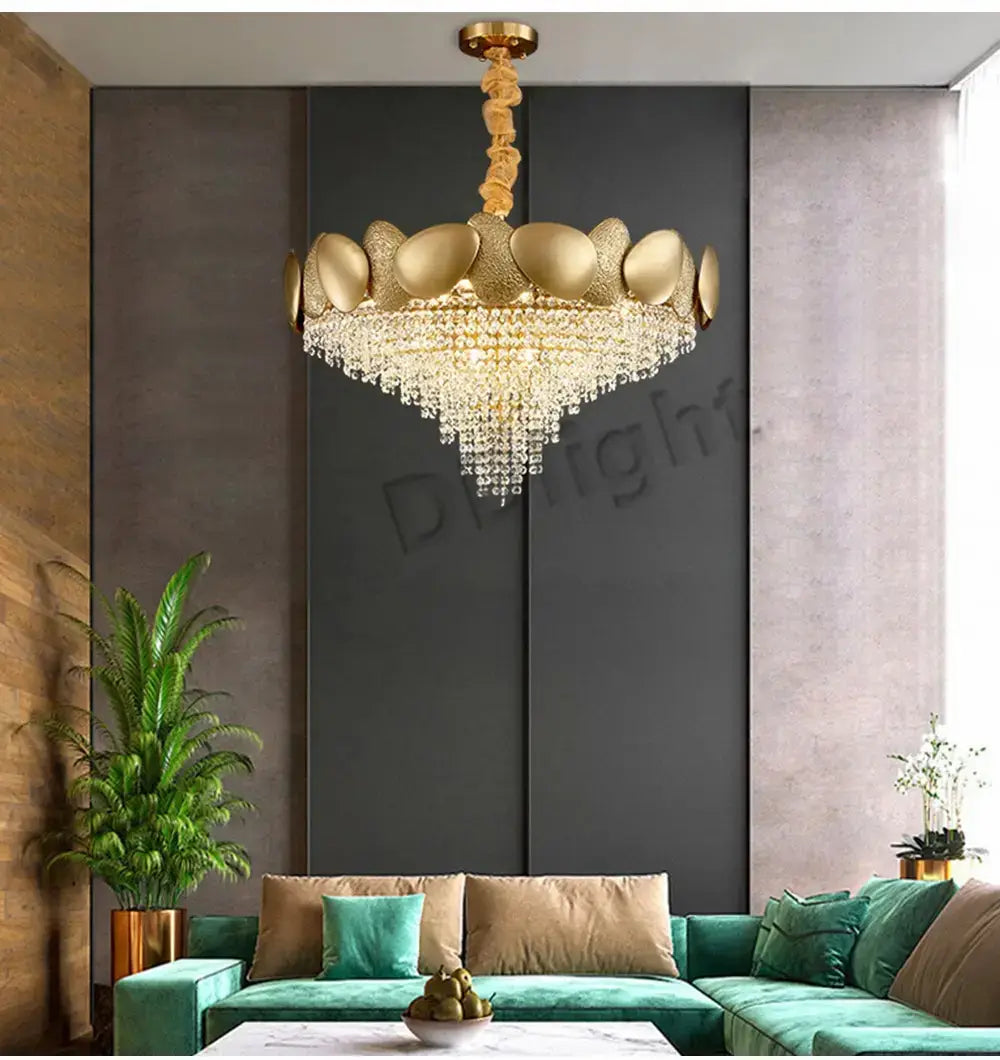 Luxury gold crystal led ceiling chandelier with a lotus-inspired design featuring intricate crystal droplets and a polished metallic finish for living room use.