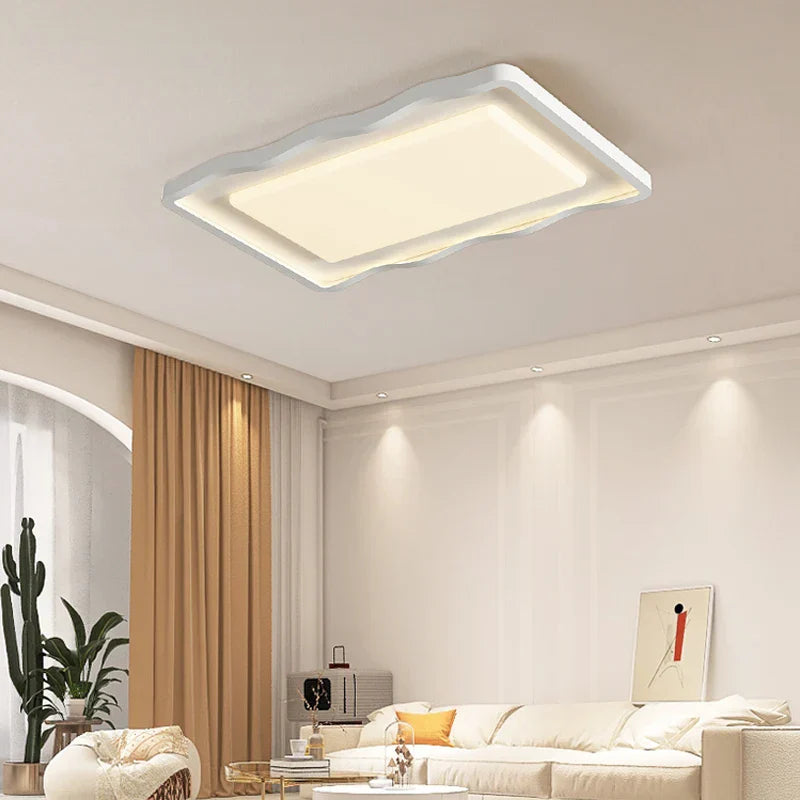 Lámparas de techo LED estilo crema DecorBites™ para una iluminación moderna y sencilla en la sala de estar.