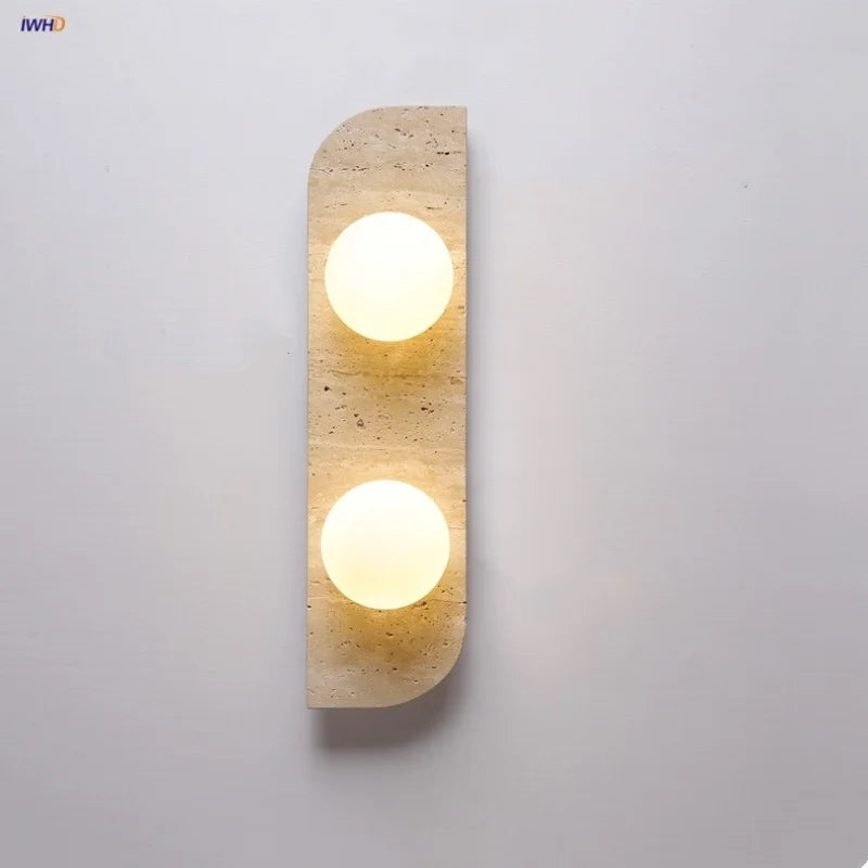 Lámpara de pared LED DecorBites™ con 2 bolas de cristal, blanca y amarilla, de piedra travertino. Luz interior.