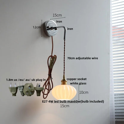 Lámpara de pared LED DecorBites™ con dosel de cerámica, cable ajustable e interruptor de cadena.