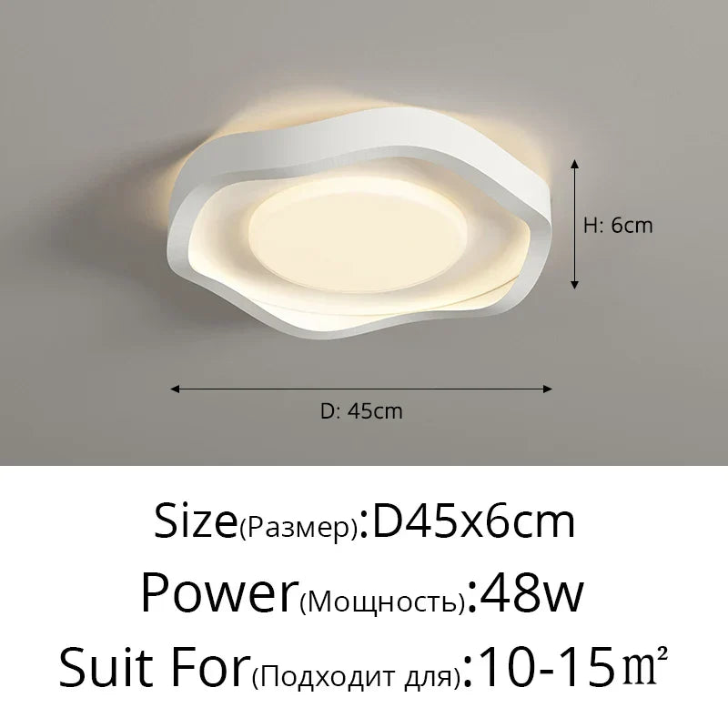 Lámparas de techo LED estilo crema DecorBites™ para una iluminación moderna y sencilla en la sala de estar.