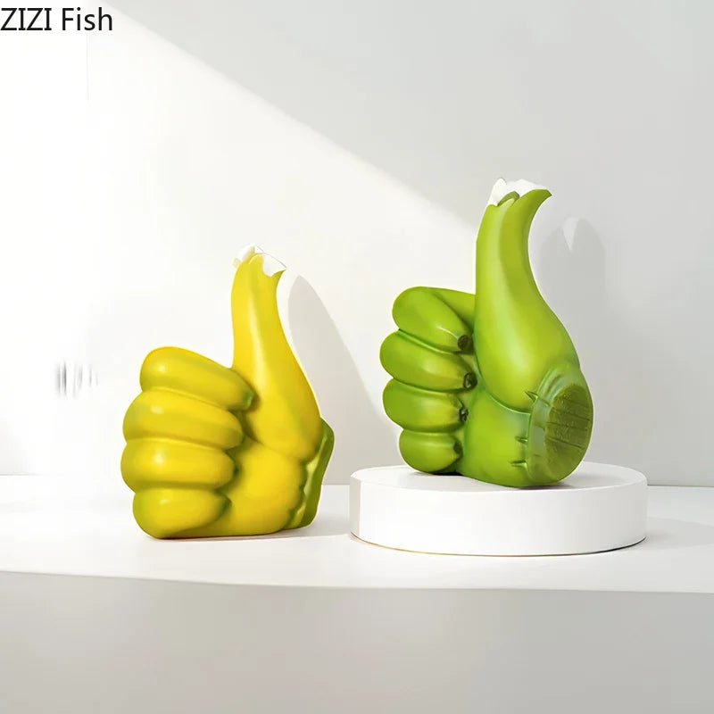 Adorno de escritorio DecorBites™: Estatua de resina con forma de puño de plátano y pulgar hacia arriba.