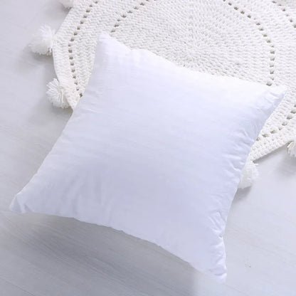 Funda de almohada DecorBites™ con borlas geométricas bordadas a mano