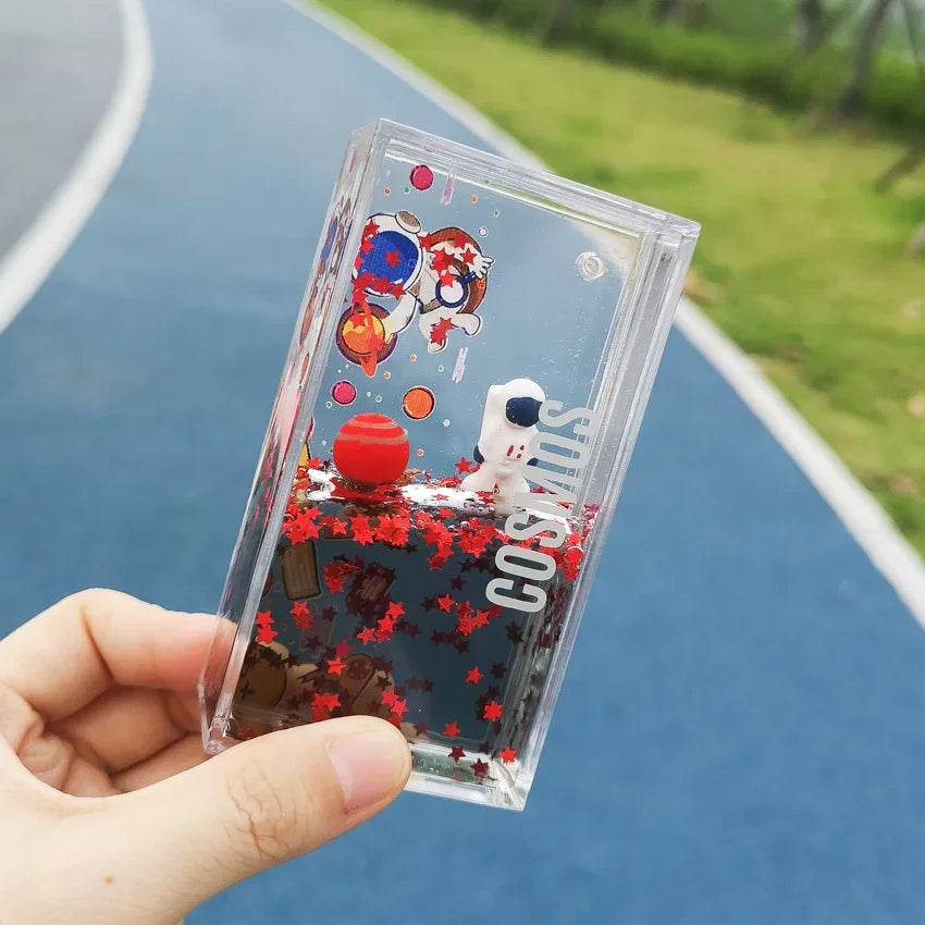 Llavero DecorBites™ Astronauta a la Deriva: Juguete antiestrés creativo con forma de reloj de arena líquido y decoración para el hogar