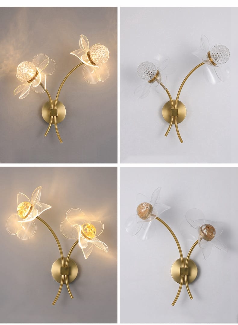 Creative floral decorative gold led wall lamp featuring a gold-toned wall sconce with two delicate translucent flower-shaped glass shades and textured crystal centers for bedroom use.