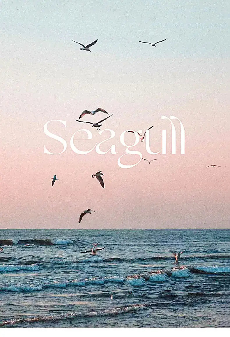 Luxury minimalist creative seagull wall lamp featuring a graceful seagull design against a soft pink and blue twilight ocean background, ideal for bedroom and living room decor.
