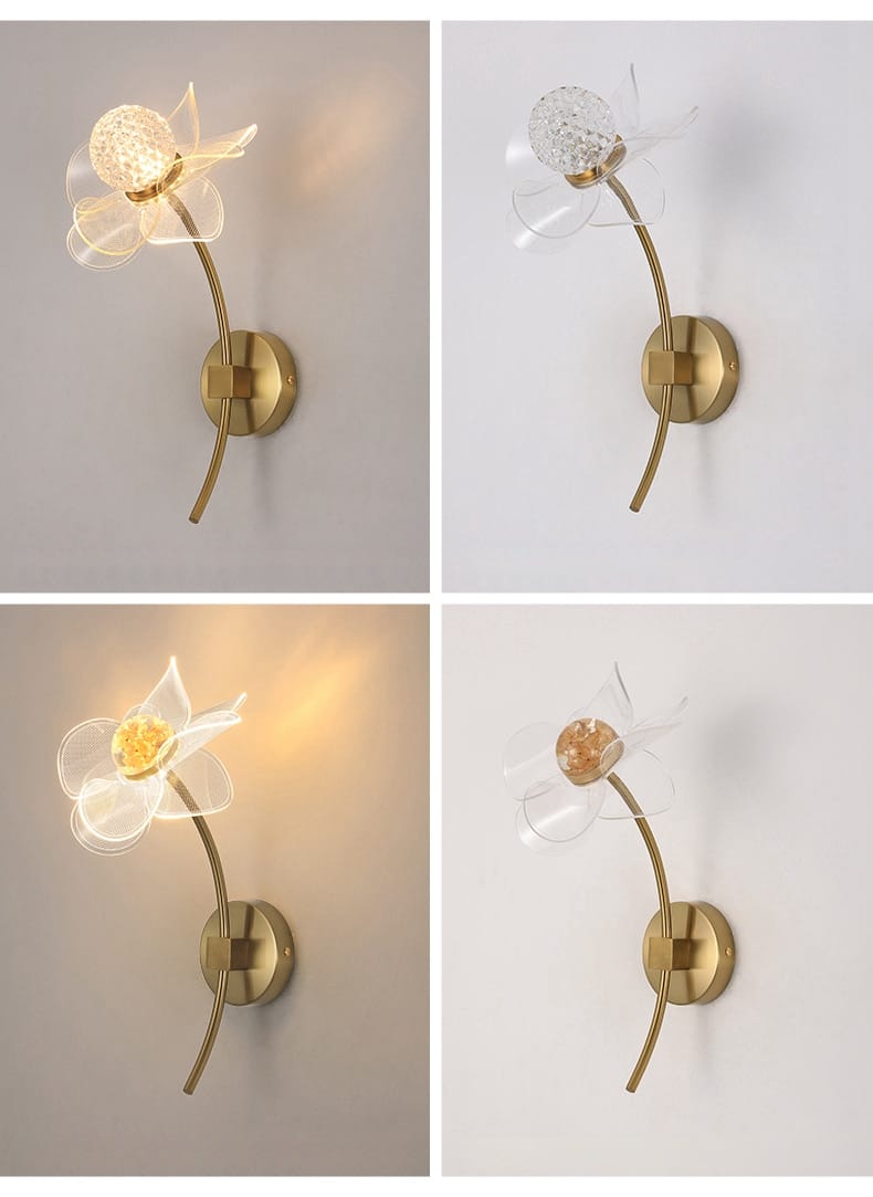 Creative floral decorative gold led wall lamp with clear flower-shaped design and crystal center for bedroom use.