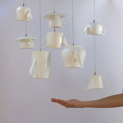 DecorBites™ Ceramic LED Pendant Lights: Nordic Teapot Design for Modern Living and Kitchen.