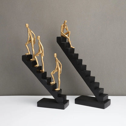 DecorBites™ Escultura abstracta de hombre dorado escalando escaleras Adornos para el hogar