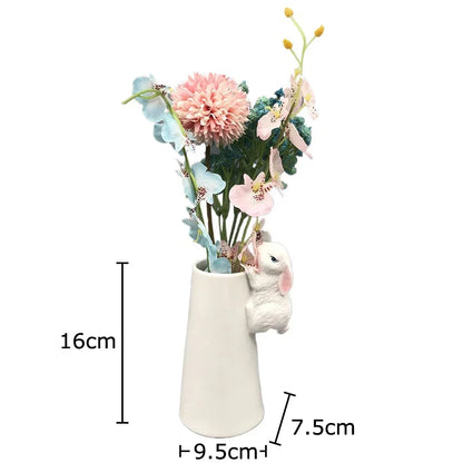 Jarrón de cerámica DecorBites™ con forma de conejo, ideal para arreglos florales, decoración de mesa y para dar un toque estético a cualquier habitación.