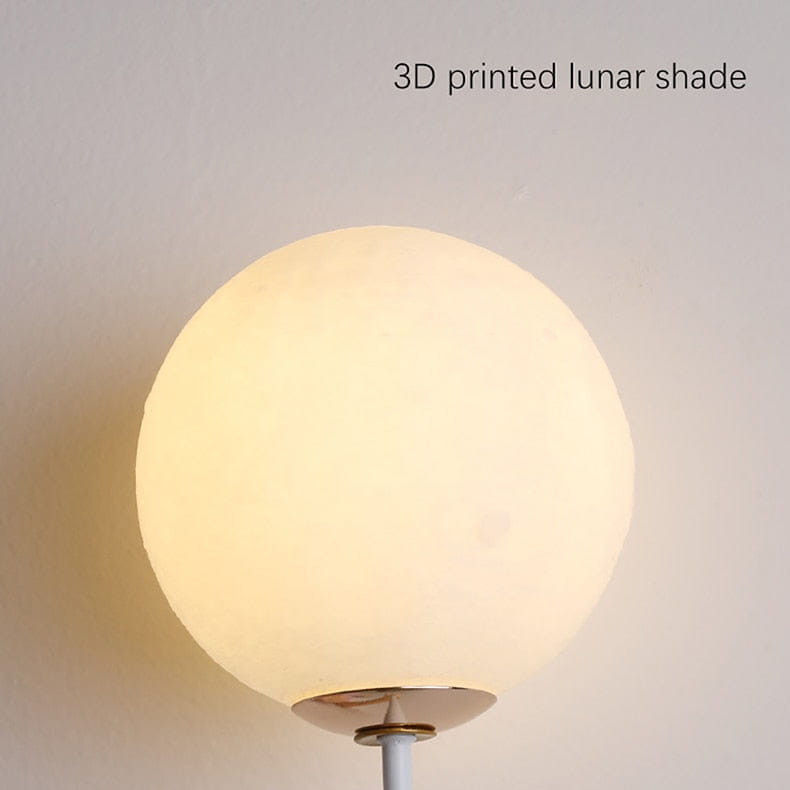 a whimsical pink polka dot fairy girl wall lamp with a softly glowing spherical 3d printed lunar shade finish for bedroom use