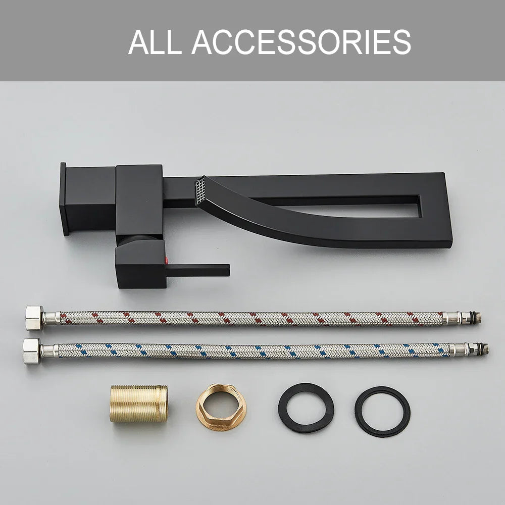 Grifo de lavabo tipo cascada DecorBites™ de latón negro con monomando