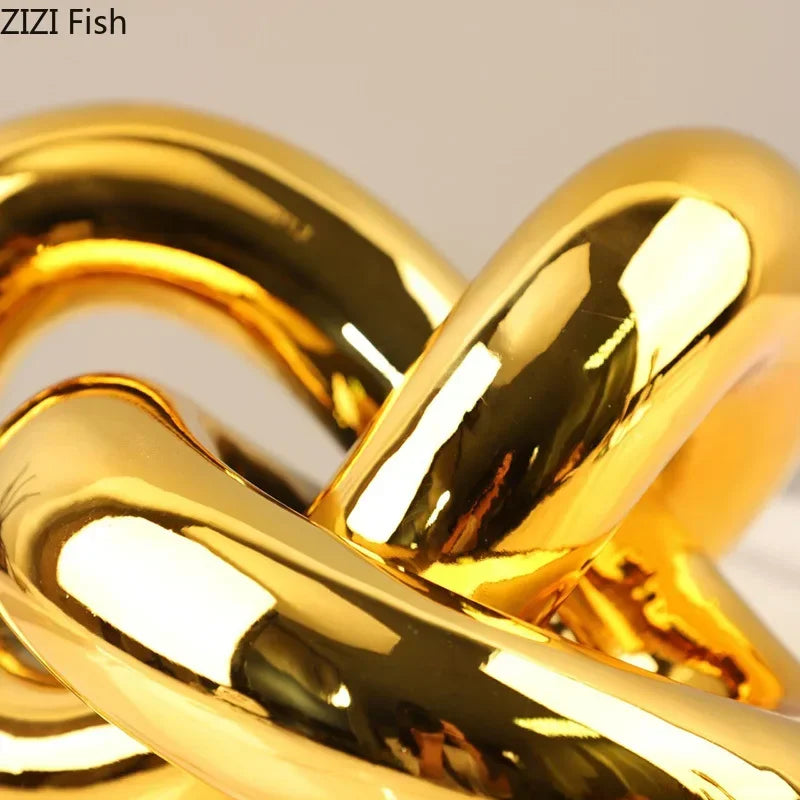 DecorBites™ Gold-plated Knot Ornaments: Modern Geometric Resin Desk Decor & Room Craft