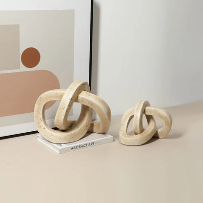 ديكوربايتس™ - تمثال فني على شكل حلقة هندسية متشابكة من الراتنج