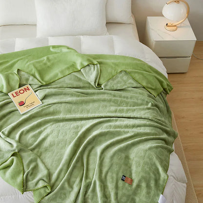 Manta DecorBites™ de terciopelo jacquard color leche para aire acondicionado | Chal cálido y de viaje para todas las estaciones