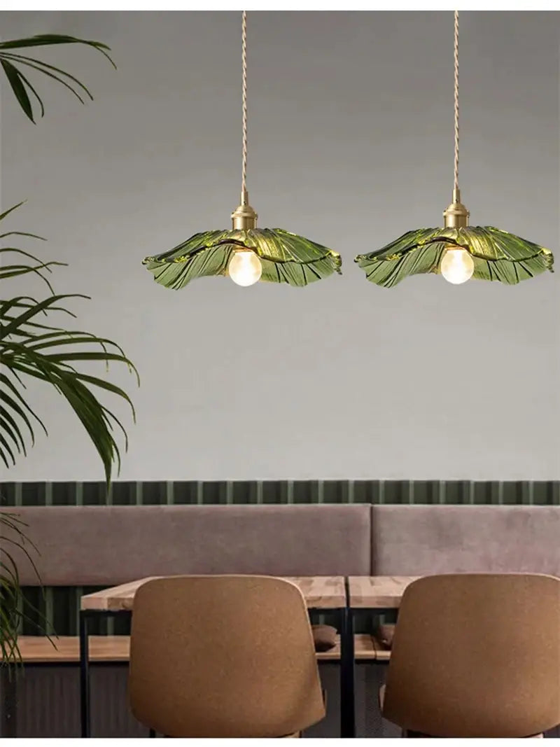Vintage pink green and white flower glass pendant lights feature green leaf-shaped glass with brass fixtures ideal for elegant dining room home decor.