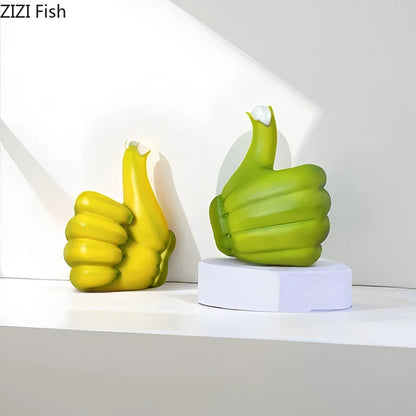 Adorno de escritorio DecorBites™: Estatua de resina con forma de puño de plátano y pulgar hacia arriba.
