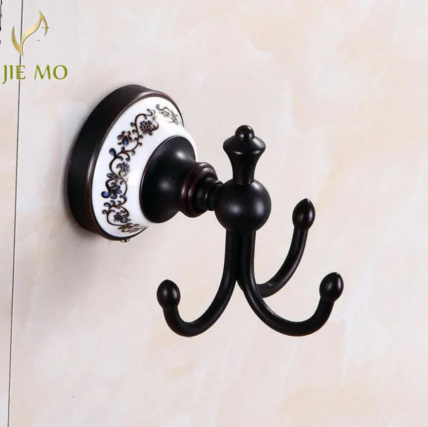 مجموعة إكسسوارات الحمام DecorBites™ المصنوعة من البورسلين الأسود والنحاس