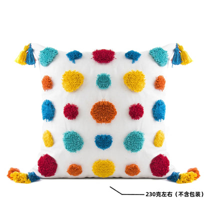 Funda de almohada DecorBites™ con borlas geométricas bordadas a mano