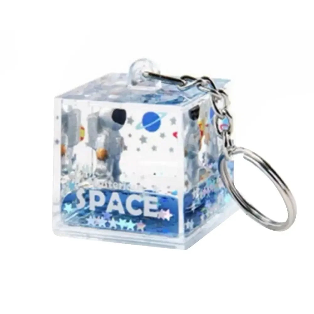 Llavero DecorBites™ Astronauta a la Deriva: Juguete antiestrés creativo con forma de reloj de arena líquido y decoración para el hogar