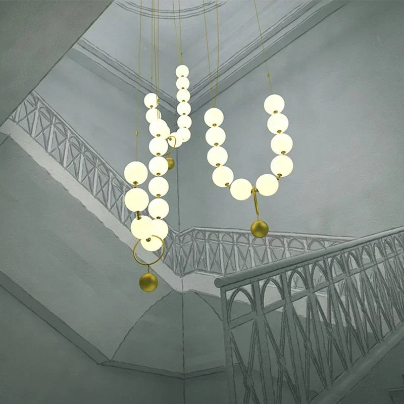 Lámpara de techo de lujo DecorBites™ Golden Necklace Chandelier para escaleras y comedor