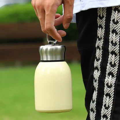 Botella de agua de viaje DecorBites™ Mini termo de acero inoxidable de 300 ml para café